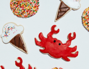 Decorated cookies from Mad Hatter's Durham Bakery, featuring ice cream cones and red crabs